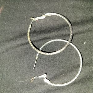 Large silver hoop earrings